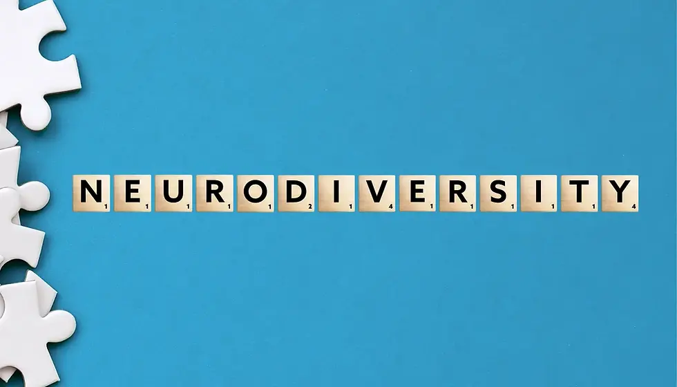 Scrabble tiles spelling "NEURODIVERSITY" on a blue background with white puzzle pieces.