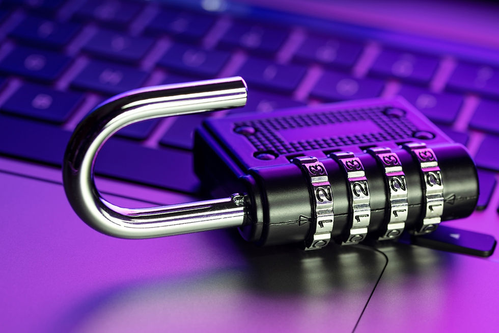 A padlock sitting on a computer keyboard